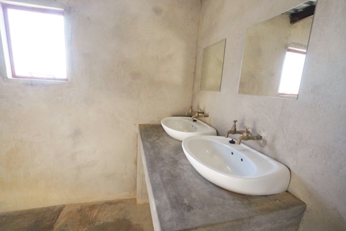 Neat and clean private bathroom facilities at each campsite at Little Sossus Camping Sesriem
